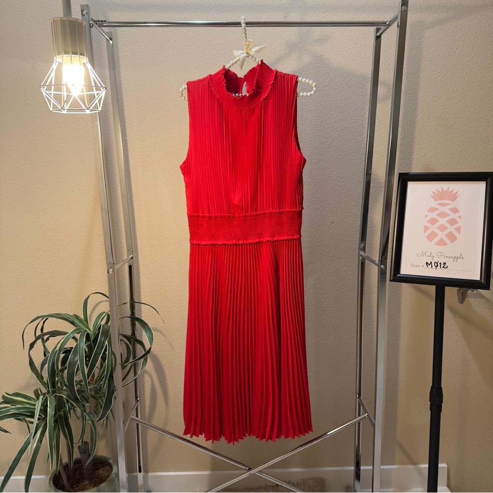 Nanette Lepore size 14 red sleeveless pleated midi dress with high neckline.